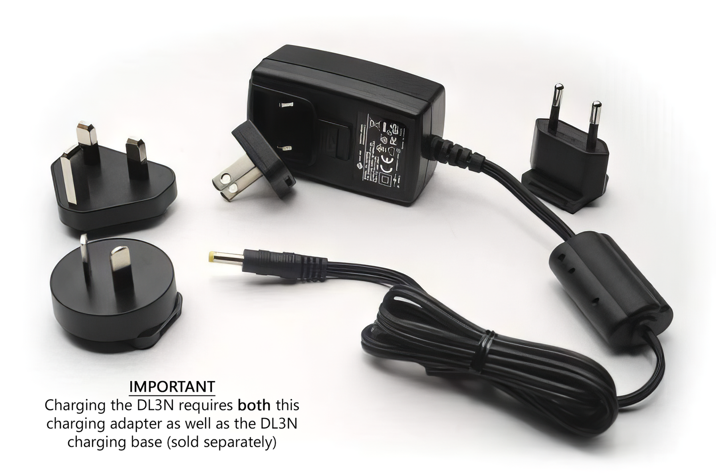 A black DermLite charger with a black plug for international adapters and as a replacement charger.